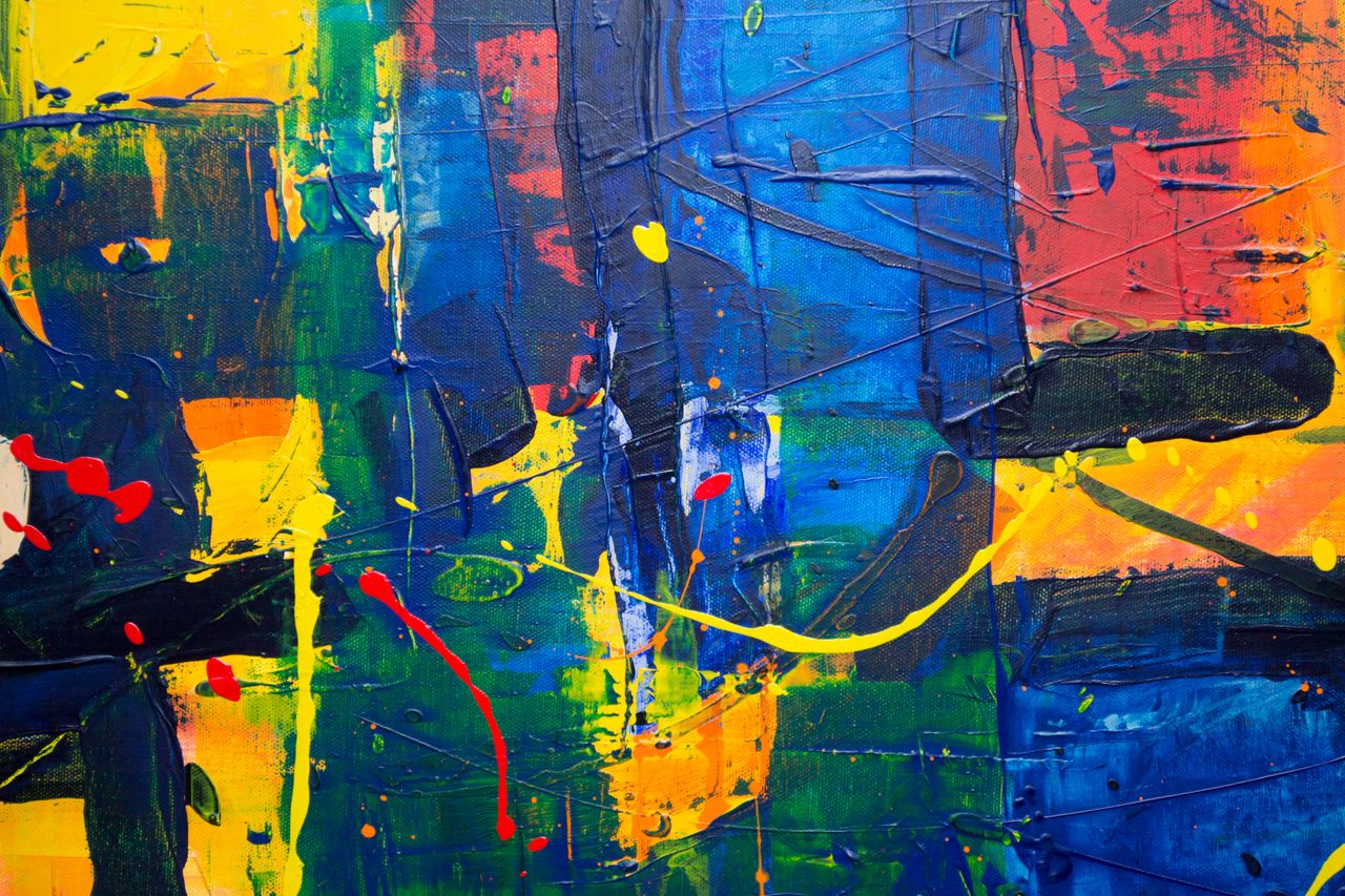Dynamic abstract painting showcasing vibrant colors and textured brushwork for artistic expression.