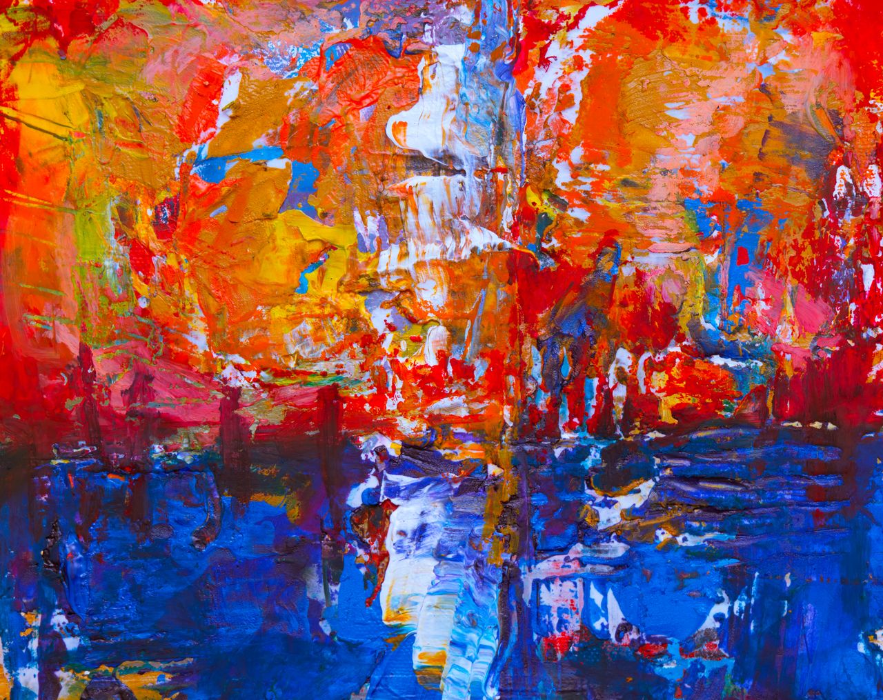 Colorful abstract painting with vivid acrylic strokes on canvas.